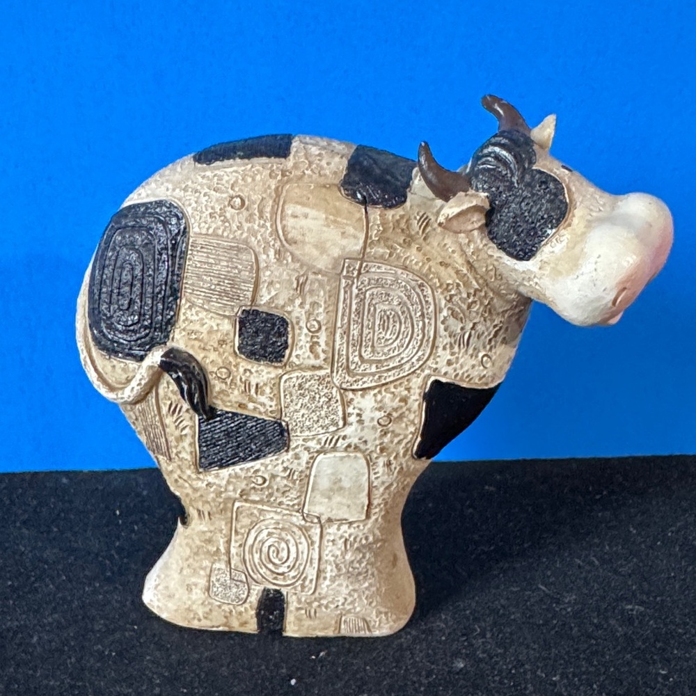 Whimsical Black and Cream Cow Art Sculpture